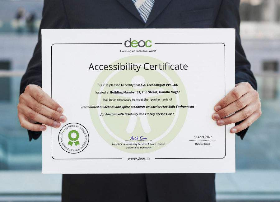 Office executive holding an Accessibility Certificate by DEOC