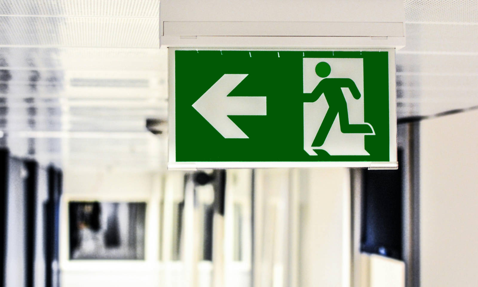 Emergency Exit sign inside a corridor